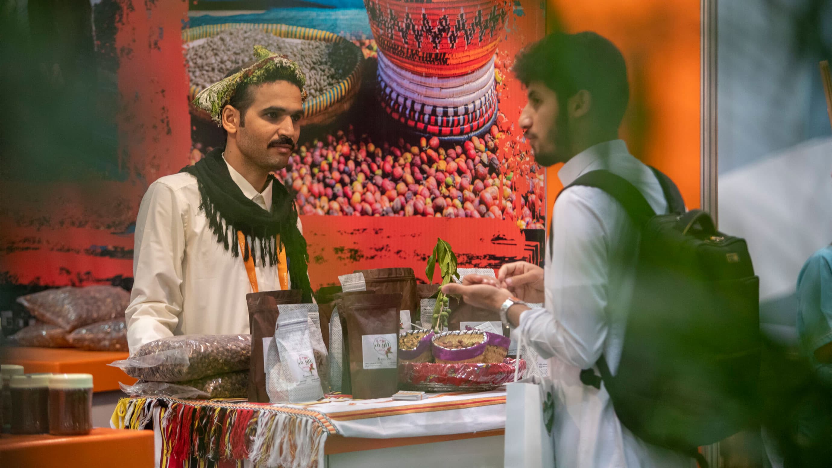 Exhibitor and visitor at a conversation